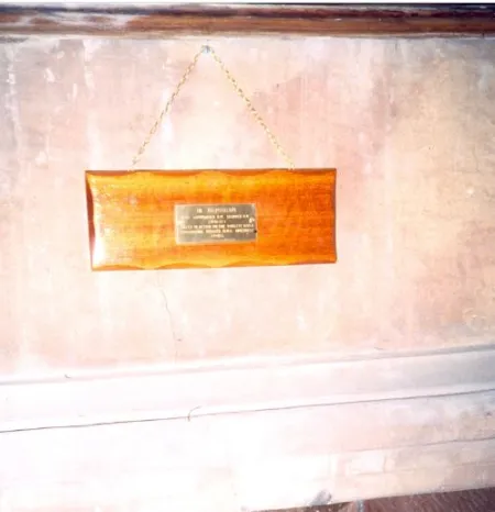Brass and wooden plaque