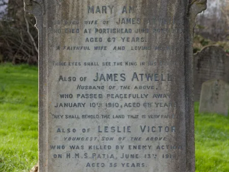 Inscription on headstone. Leaded lettering.