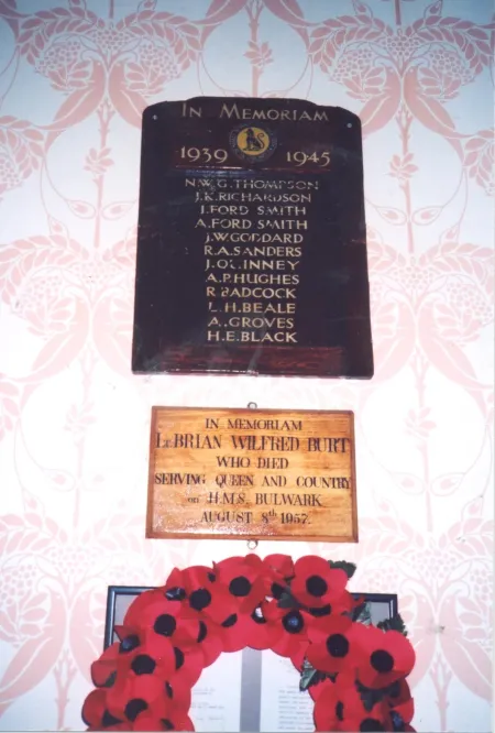 Rectangular wooden plaque with inscribed name