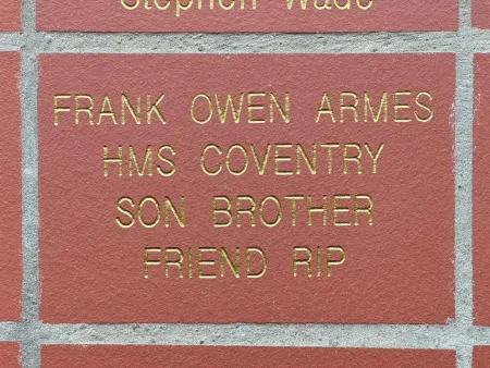A brick engraved with the subjects name and ship.