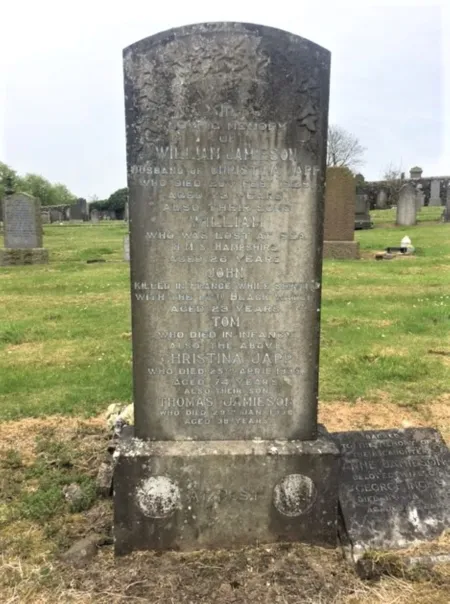 Tall stone family gravestone