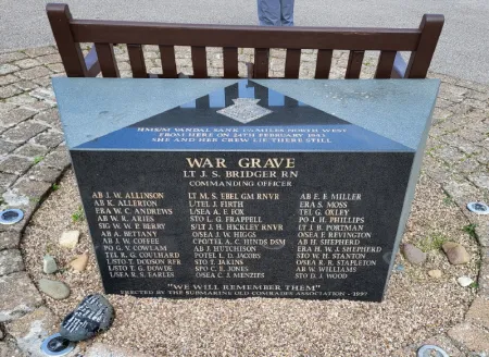 Granite block with gold inscription