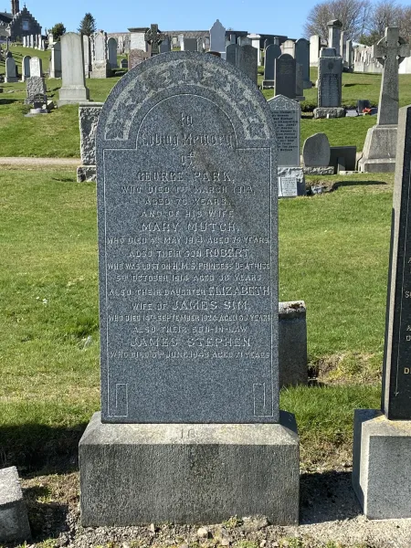 Granite gravestone with a fully rounded top.