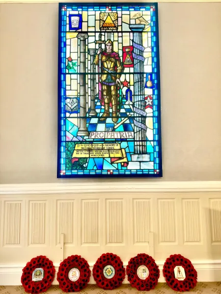 Image of stained glass memorial from a short distance away