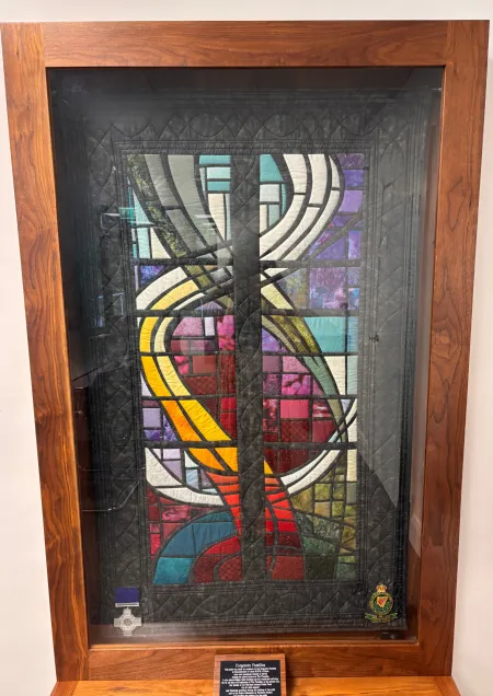 Quilt mounted in a frame