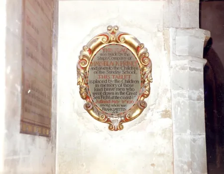 Inscribed oval tablet, with gilt surround, commemorating Able Seaman Frank Smitten and his crewmates of the Black Prince.