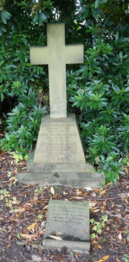 The grave, with the memorial scroll