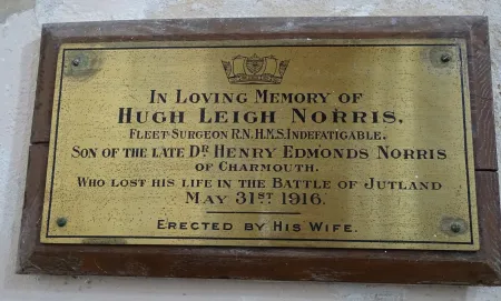Commemorative plaque to Fleet Surgeon Hugh Norris who  died at Jutland St Andrews Charmouth Dorset