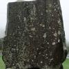 Memorial of rough square-shaped stones piled into a massive monument.