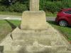 Dedication on plinth and steps