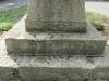 Dedication on plinth and steps