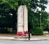 Stone obelisk on traffic island
