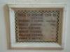 Wall mounted stone tablet within stone frame. 