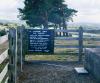 Memorial funding notice on fence