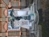Memorial overview including bronze allegory and commemorative plaques