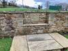 Tablet on rear wall of garden