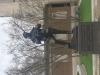 Front of statue.