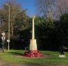 Cross on plinth with paving surround