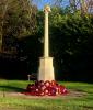 Cross on plinth with paving surround
