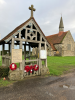 Memorial gate with church in background