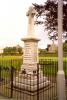Celtic cross on plinth.
