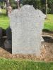 Broken family gravestone