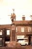 Angel figure on plinth.
