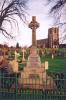 Celtic cross with names on its base.