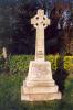 Celtic cross with list of names on its base.