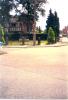 View of memorial and flowerbed from across the street.