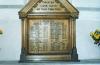 Wooden board with list of names.