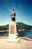 Statue on stone base.