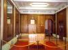 Hall with wooden panels in the back