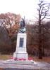 Statue on base.