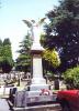 Winged victory statue on plinth.