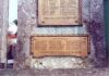 Plaque with raised lettering.