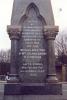 Tablet with inscription on the side of the memorial.