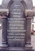 Tablet with engraved lettering on the side of the memorial.