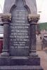 Tablet with engraved inscription on the side of the memorial.