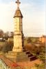 Memorial with cross on the top.