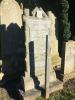 Granite family gravestone supported by a stake