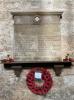 Memorial plaque and wreath