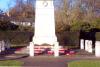 Cenotaph with wreaths laid at its base.