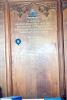 Wooden board with names.