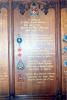 Wooden board with list of names.