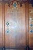 Wooden board with names.