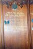 Wooden panel with names.
