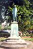 Statue of woman on a plinth.