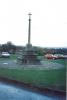 Cross on plinth.