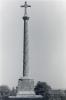 Cross on top of column.